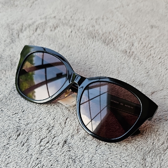 Gucci Black Sunglasses with Gold Case
